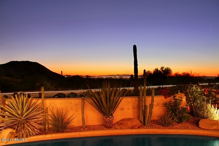 11059 East Turnberry Road Scottsdale, AZ 85255 - Photo 7 of 35 a view of a lake with a mountain