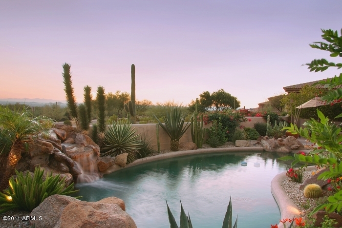 11059 East Turnberry Road Scottsdale, AZ 85255 - Photo 8 of 35 a view of a lake with a city
