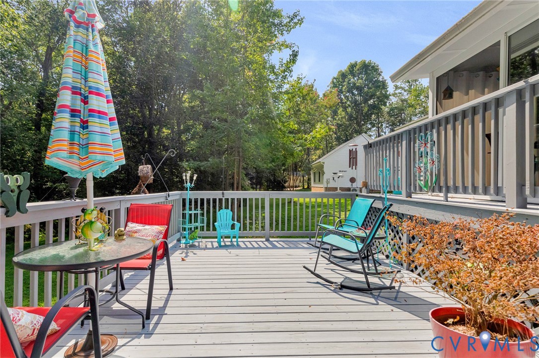 3841 Strawhill Road Richmond, VA 23231 - Photo 40 of 56 Expansive outdoor deck featuring wood-finish floor