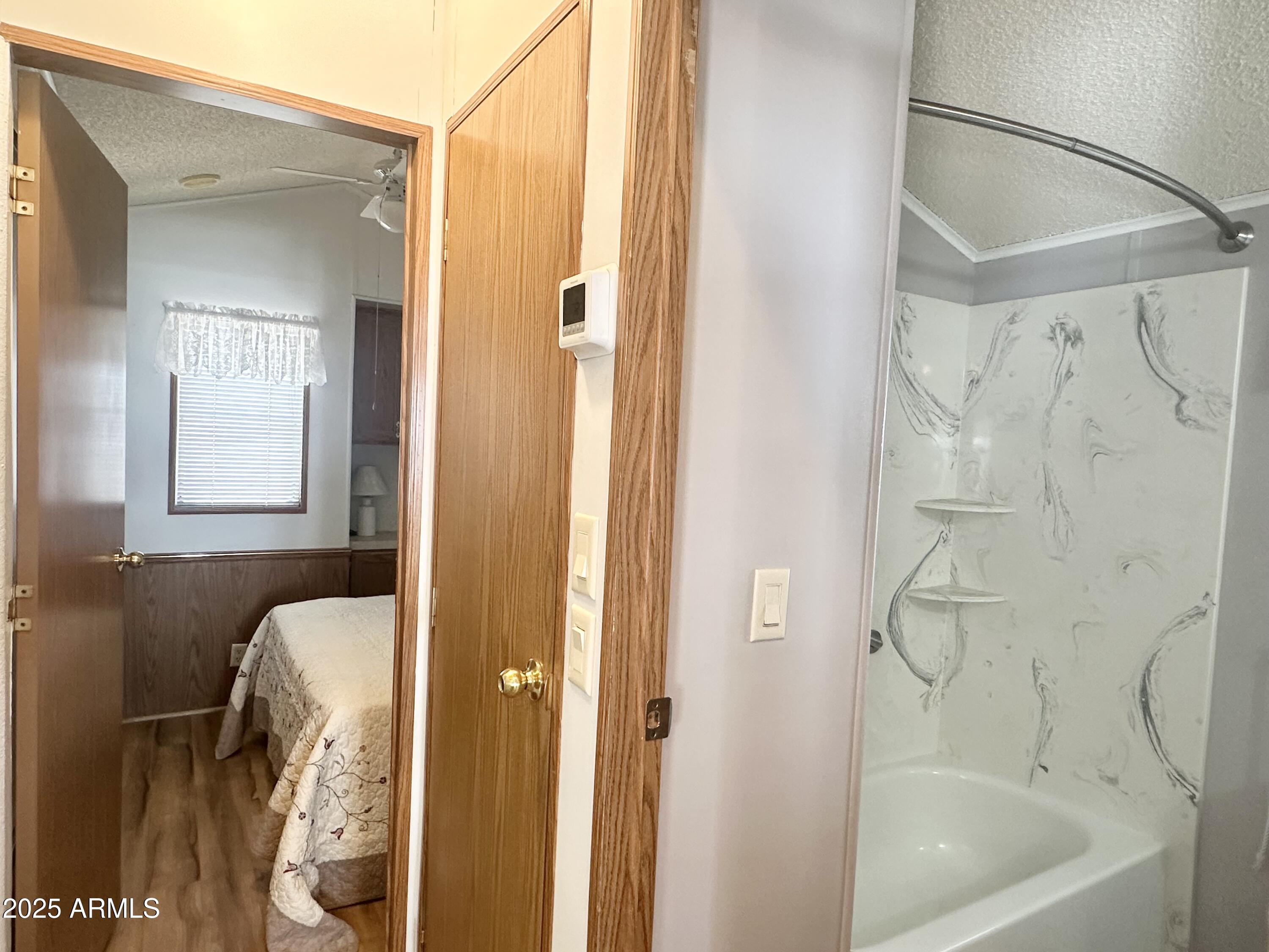 457 South Jasper Drive Apache Junction, AZ 85119 - Photo 18 of 51 BATHROOM/BEDROOM ENTRY