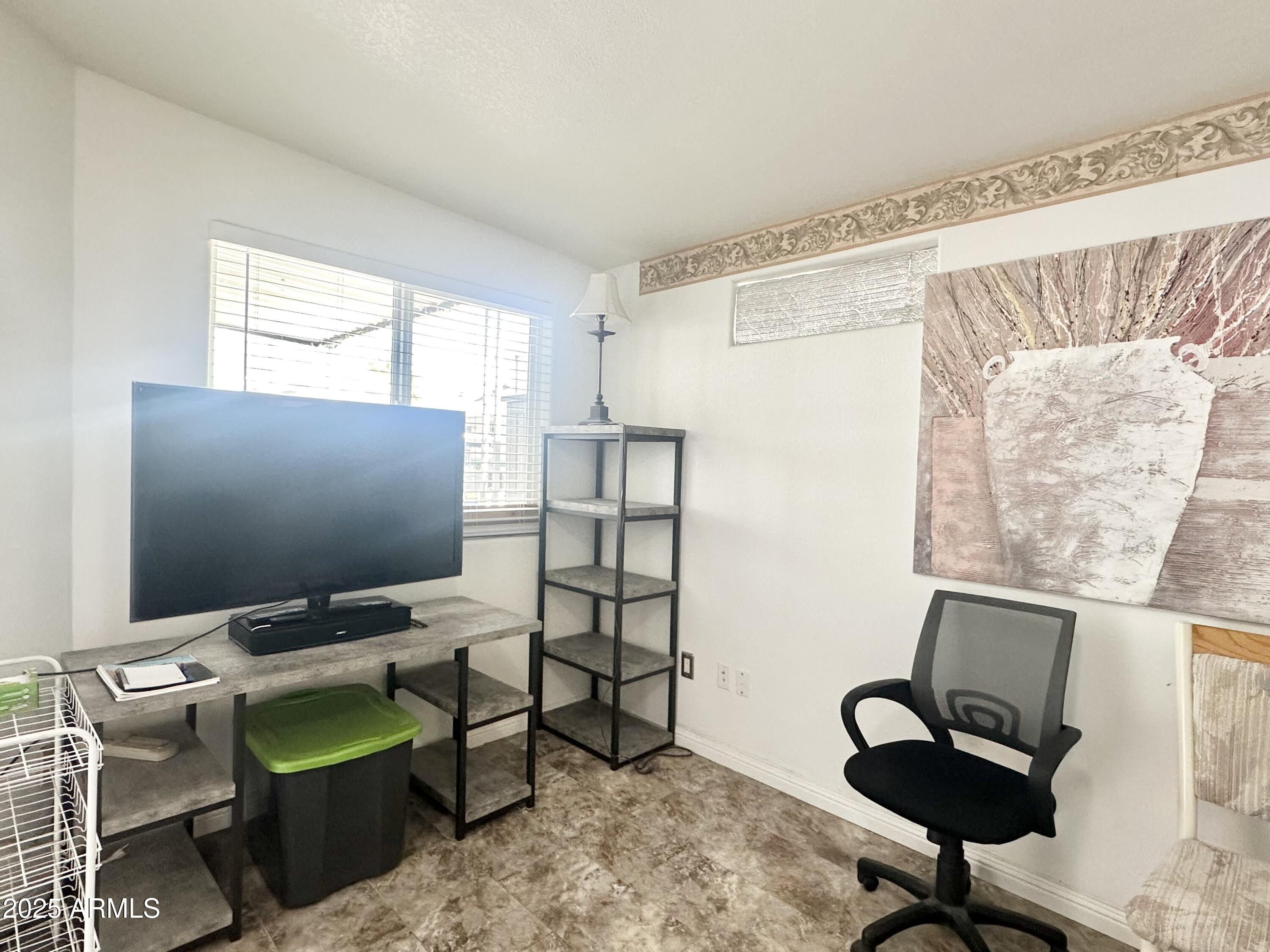 457 South Jasper Drive Apache Junction, AZ 85119 - Photo 31 of 51 TV AREA