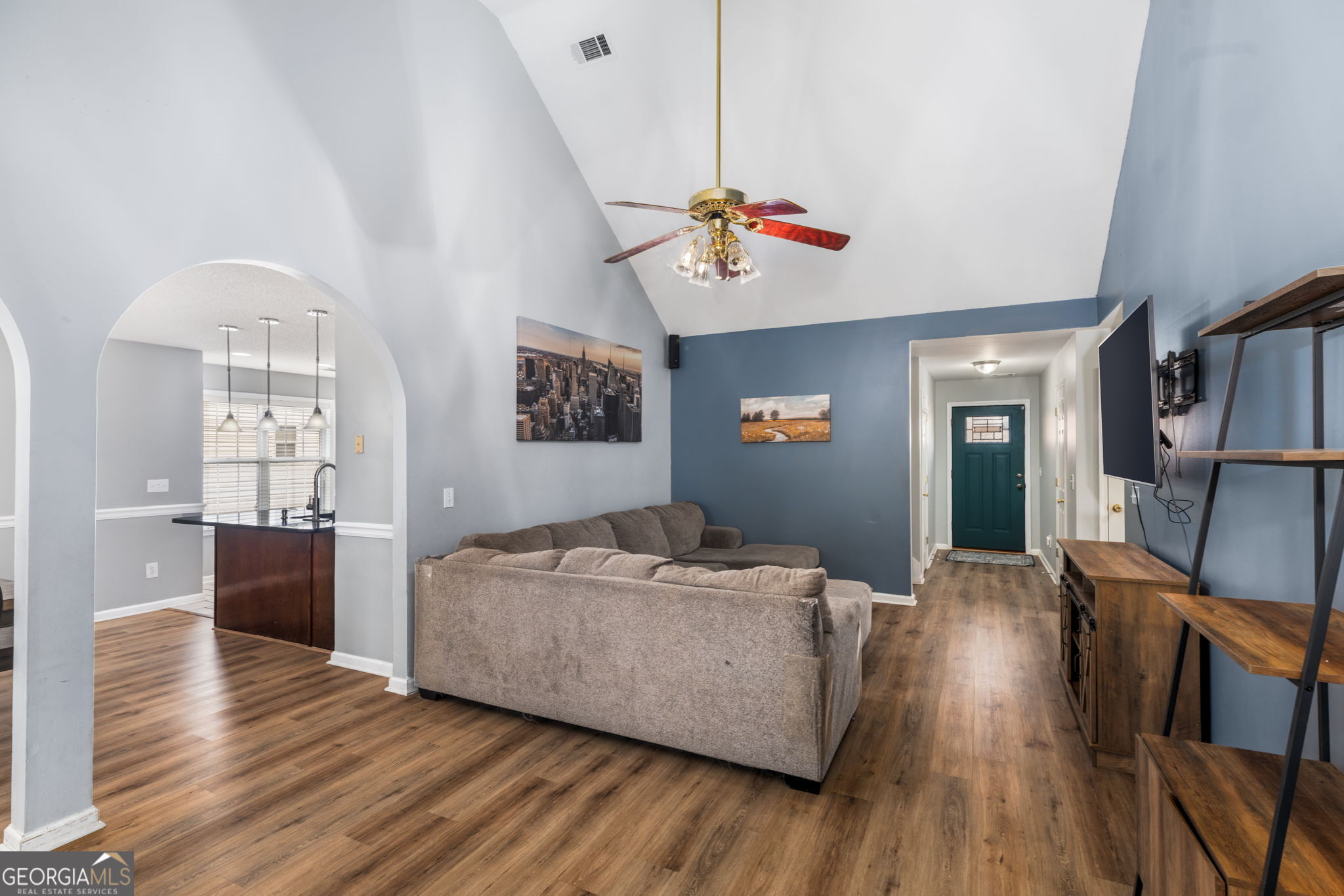 113 Hummingbird Lane Kathleen, GA 31047 - Photo 20 of 44 a living room with furniture and a wooden floor