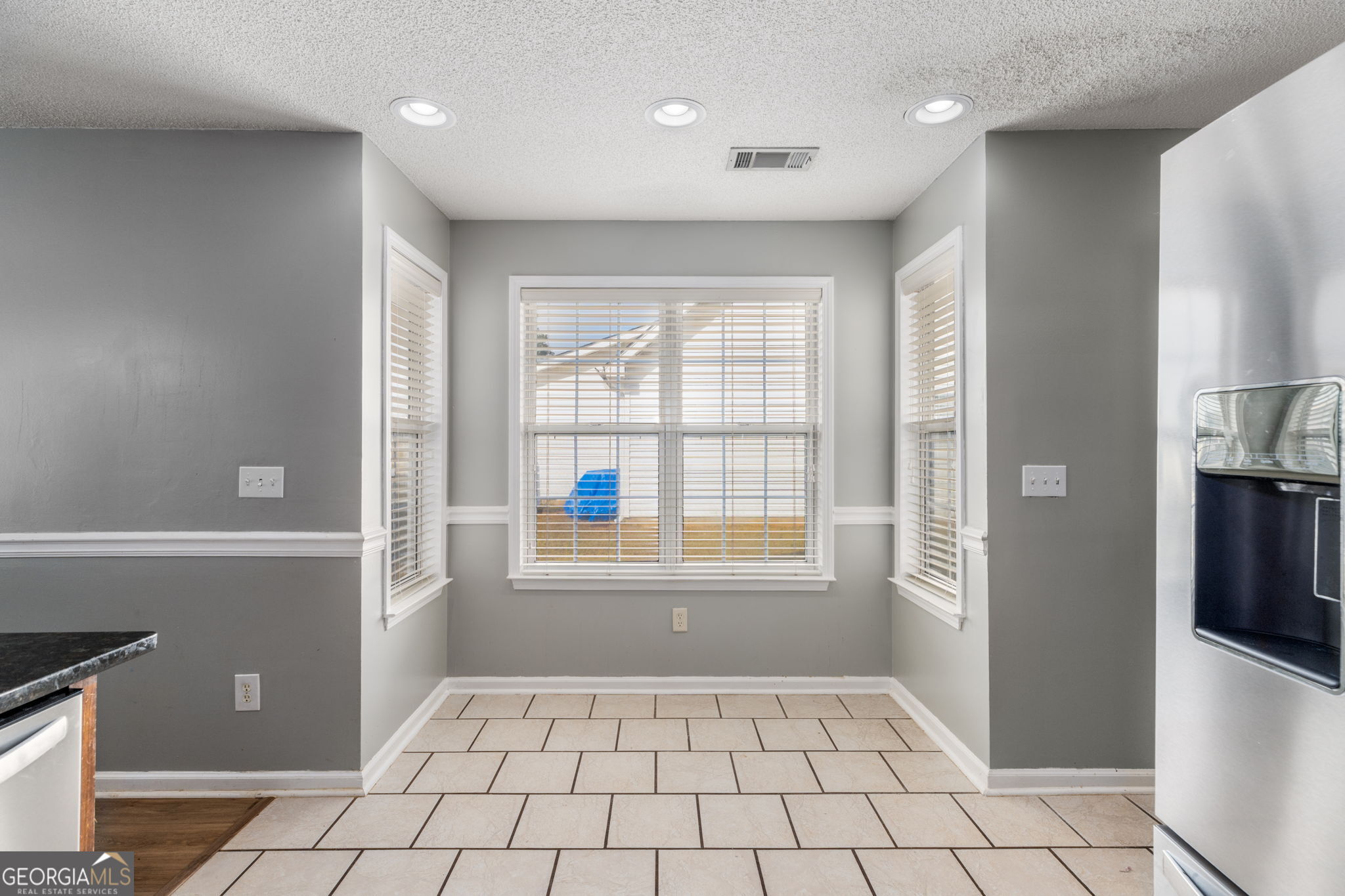 113 Hummingbird Lane Kathleen, GA 31047 - Photo 30 of 44 a view of an empty room with a window
