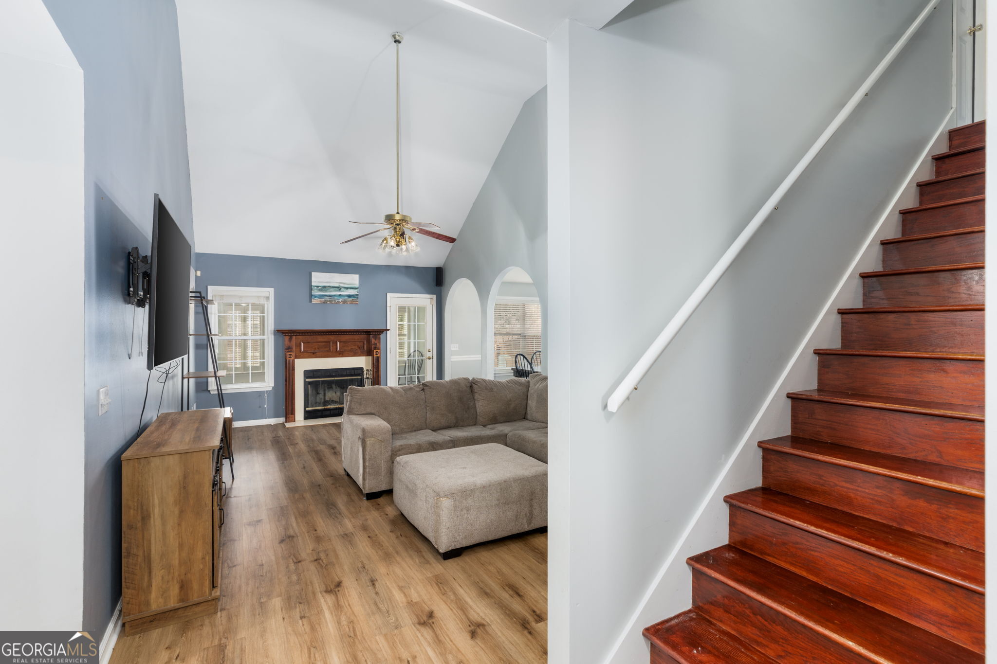 113 Hummingbird Lane Kathleen, GA 31047 - Photo 31 of 44 a living room with furniture and a fireplace