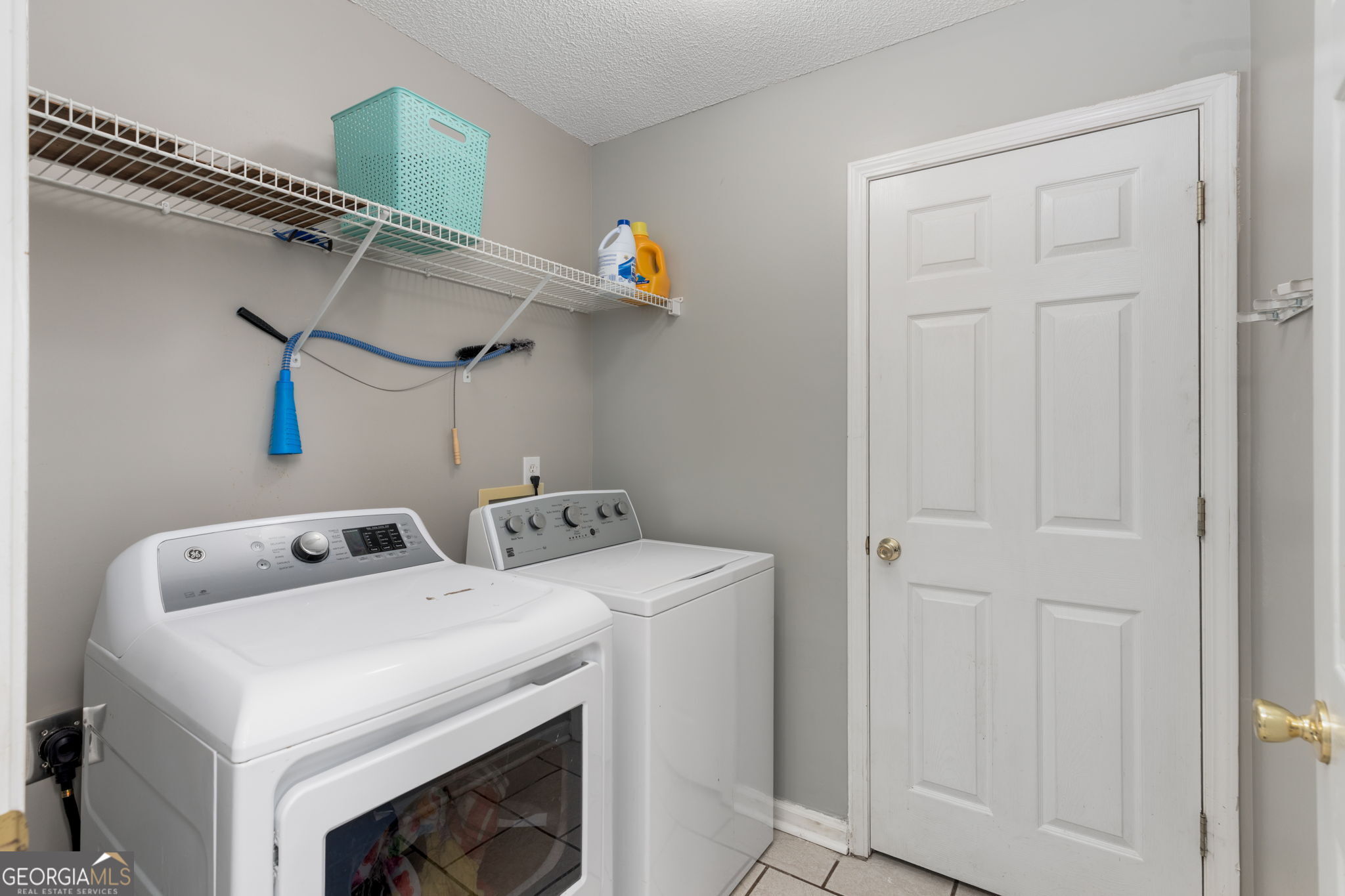 113 Hummingbird Lane Kathleen, GA 31047 - Photo 39 of 44 a utility room with dryer and washer
