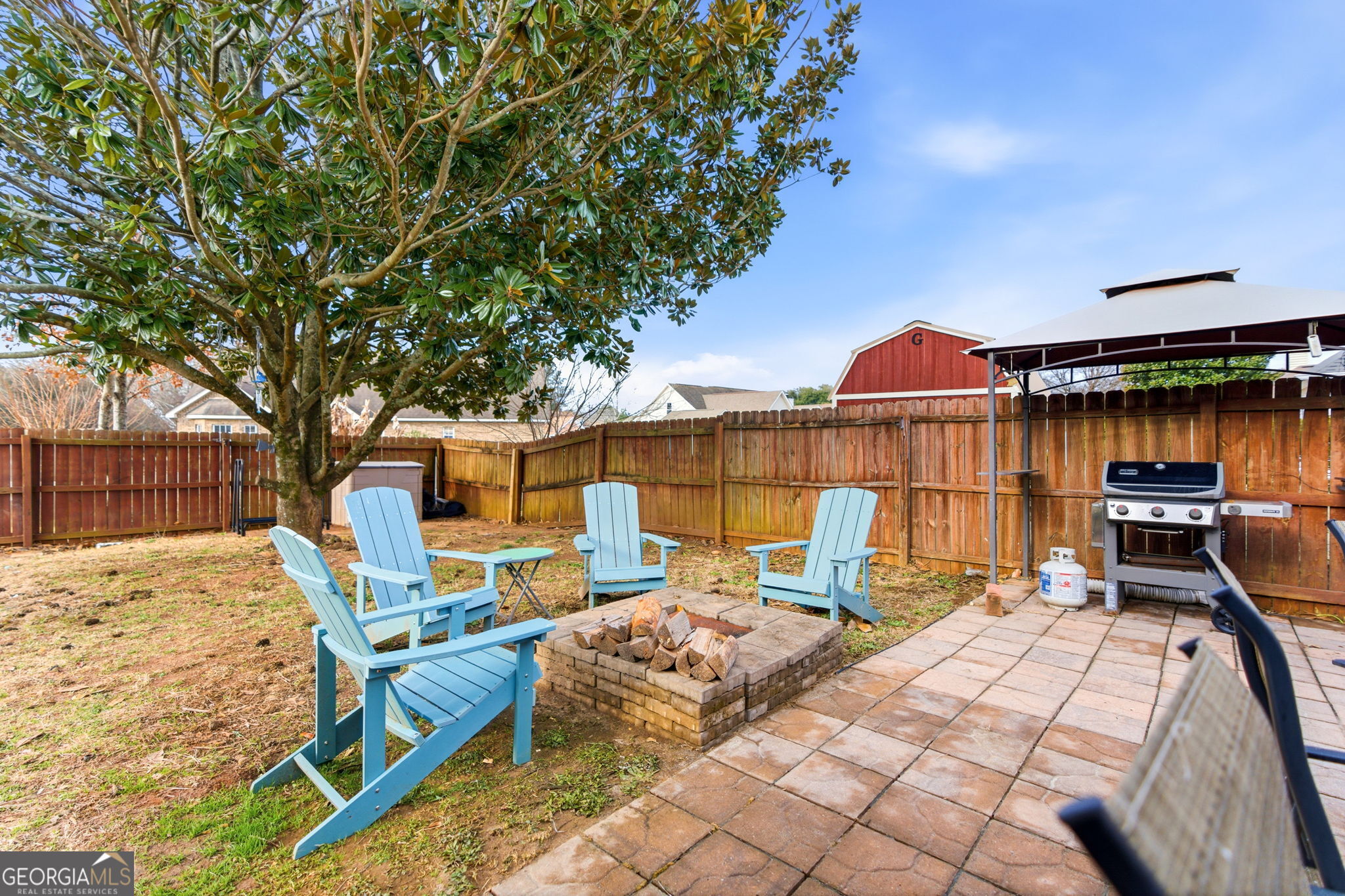113 Hummingbird Lane Kathleen, GA 31047 - Photo 40 of 44 a balcony with table and chairs