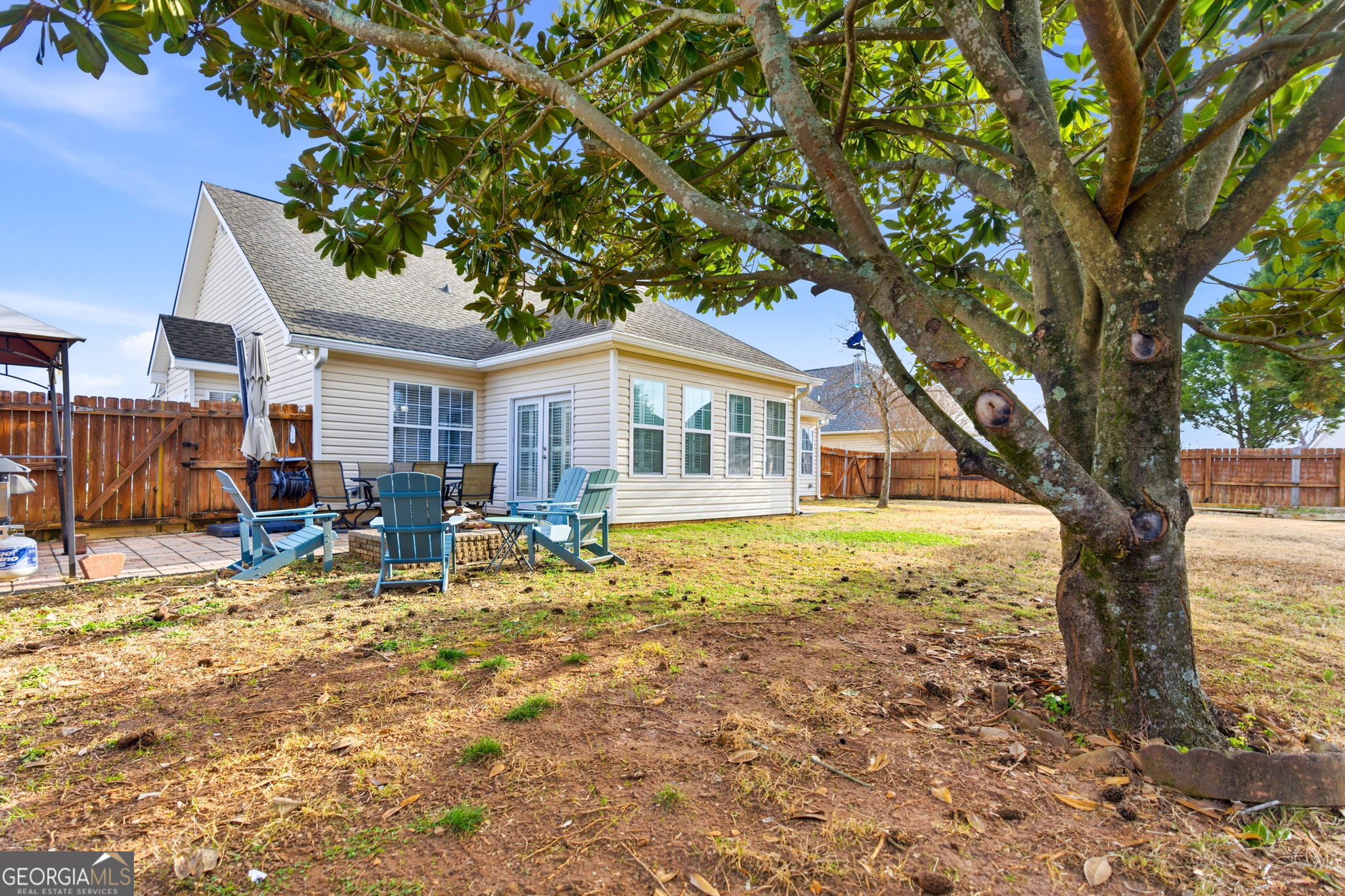 113 Hummingbird Lane Kathleen, GA 31047 - Photo 41 of 44 a house that has a tree in front of it