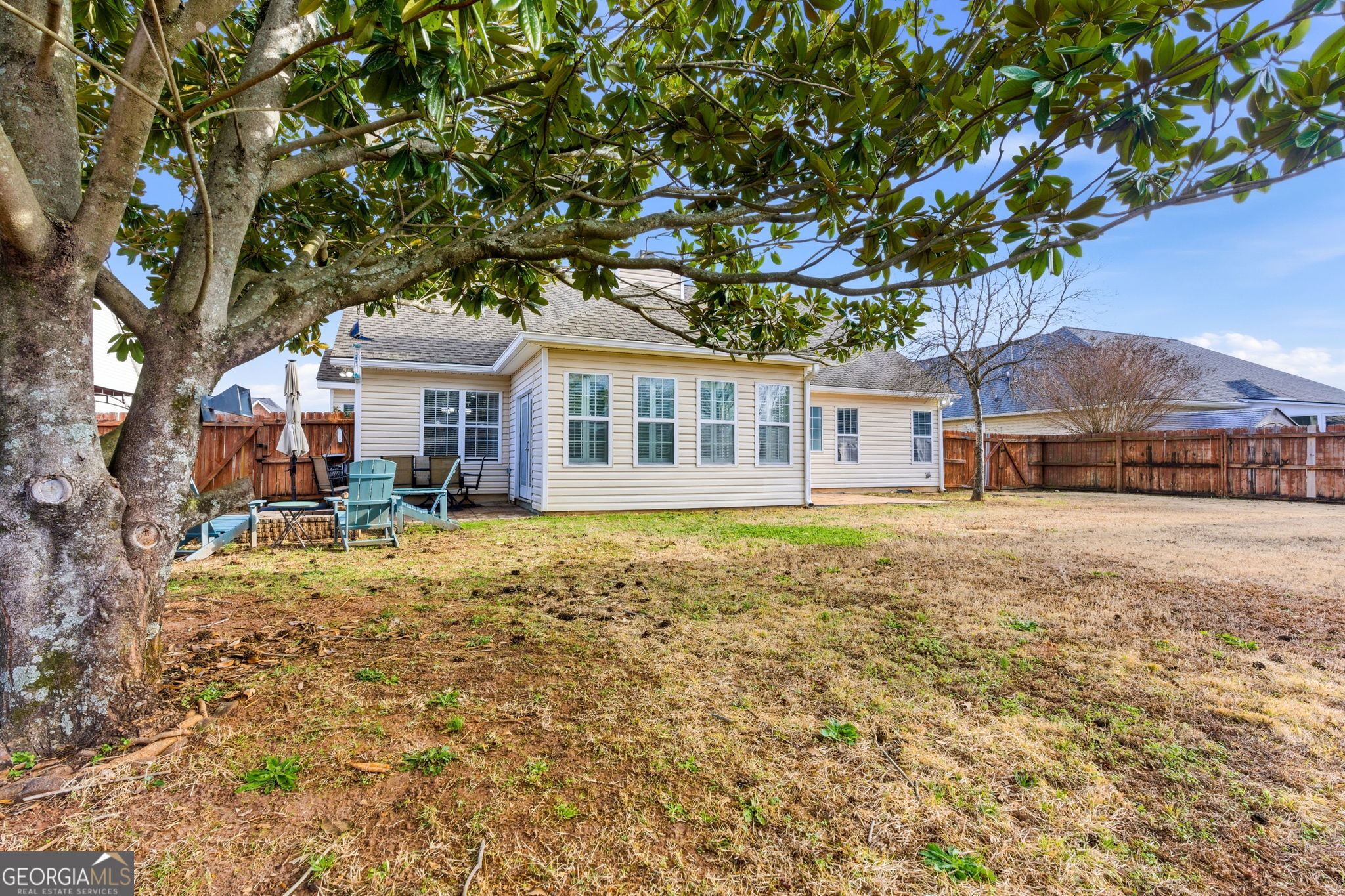 113 Hummingbird Lane Kathleen, GA 31047 - Photo 42 of 44 a front view of a house with a garden