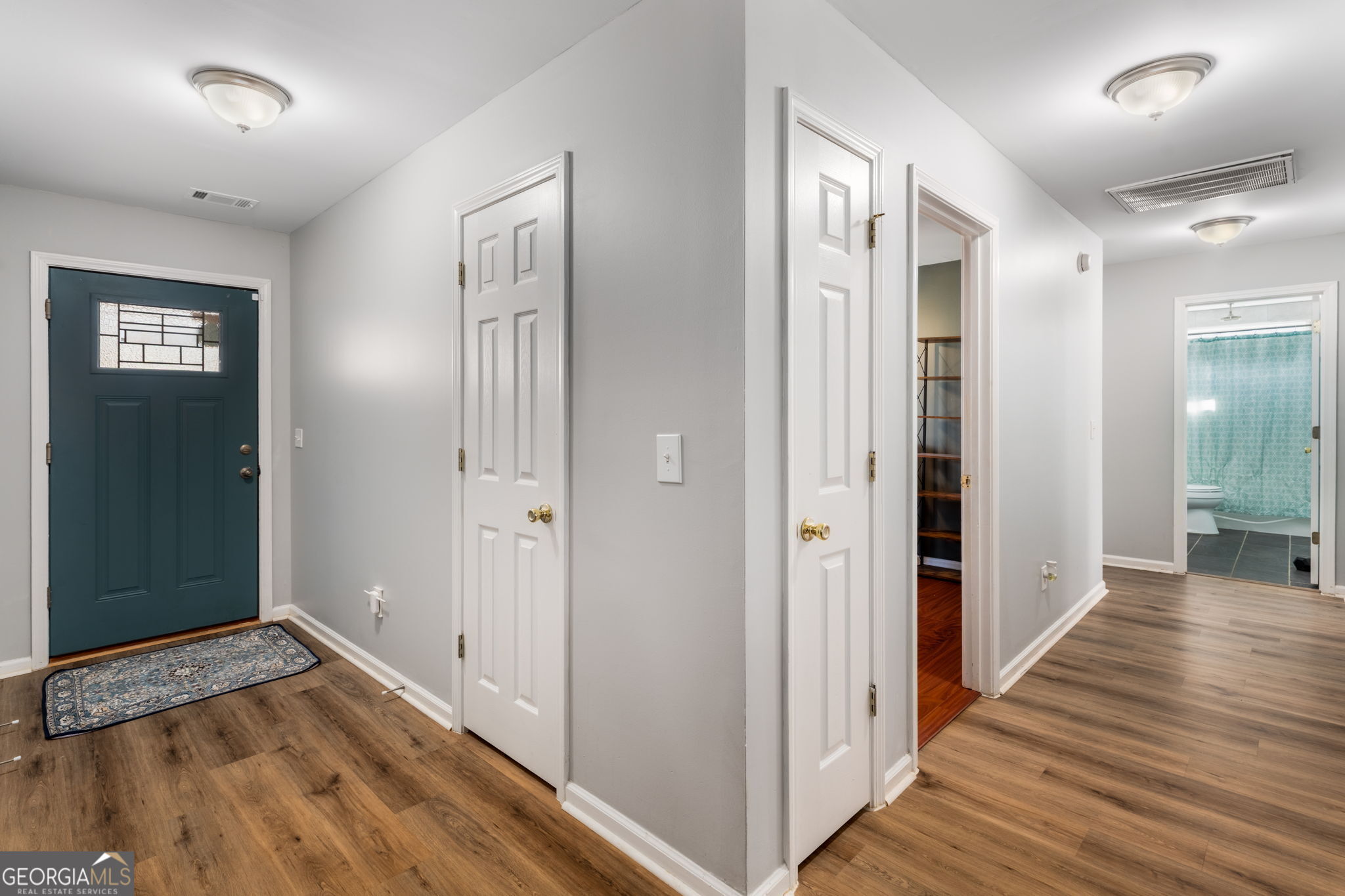 113 Hummingbird Lane Kathleen, GA 31047 - Photo 5 of 44 a view of a hallway with wooden floor