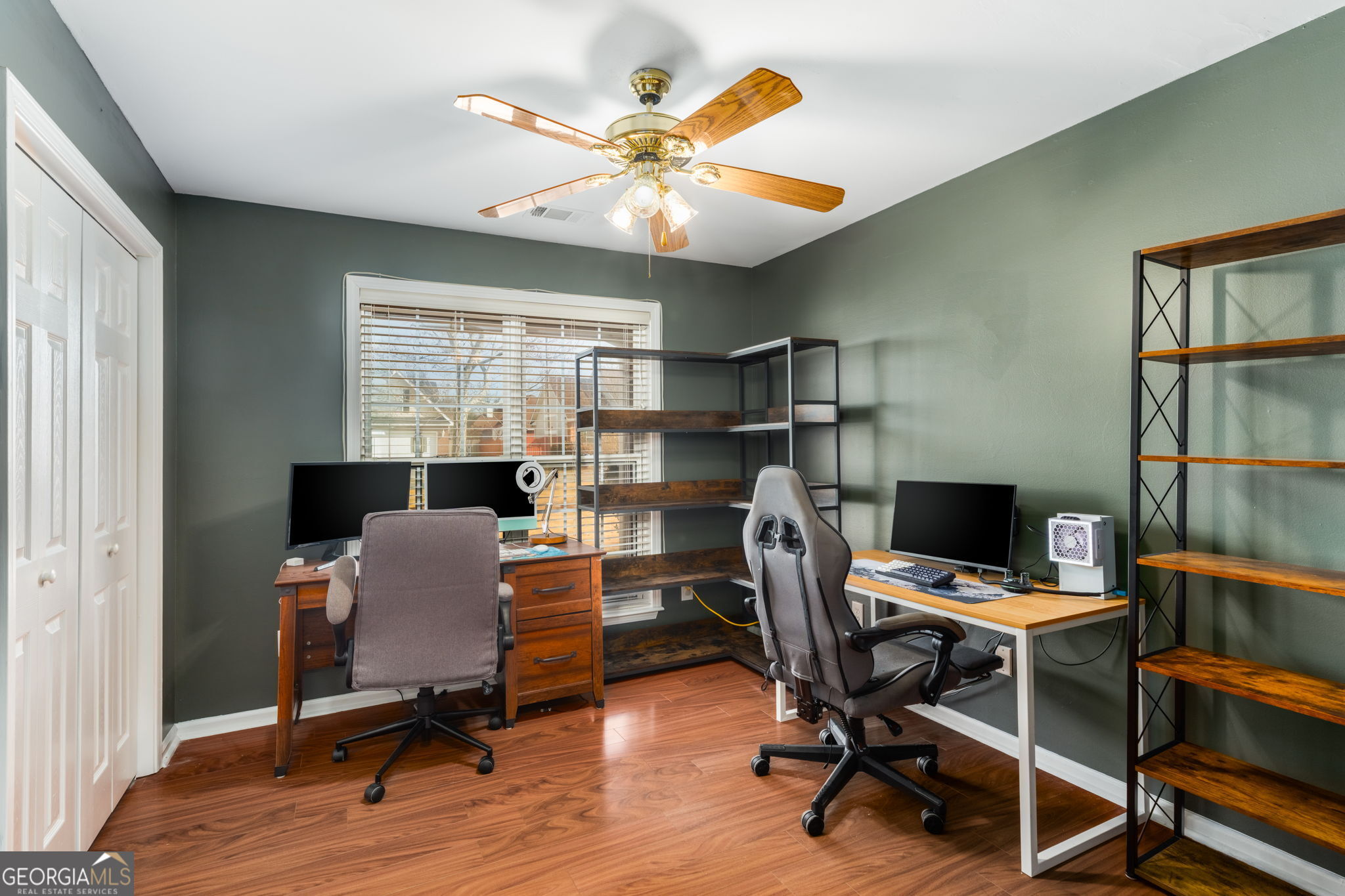 113 Hummingbird Lane Kathleen, GA 31047 - Photo 7 of 44 a view of a workspace with furniture and a window