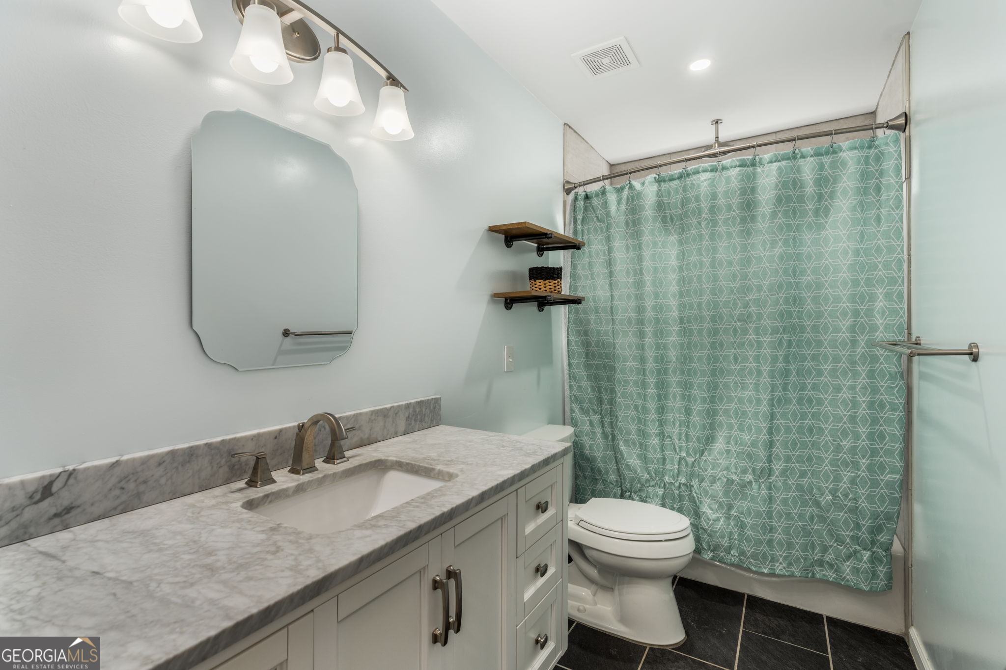 113 Hummingbird Lane Kathleen, GA 31047 - Photo 9 of 44 a bathroom with a granite countertop sink toilet and shower