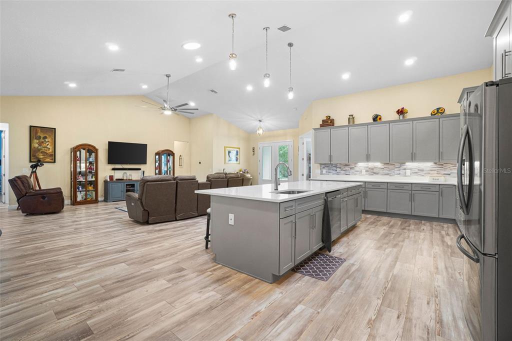 3230 Pheasant Trail Mims, FL 32754 - Photo 14 of 71 a large kitchen with a lot of counter top space