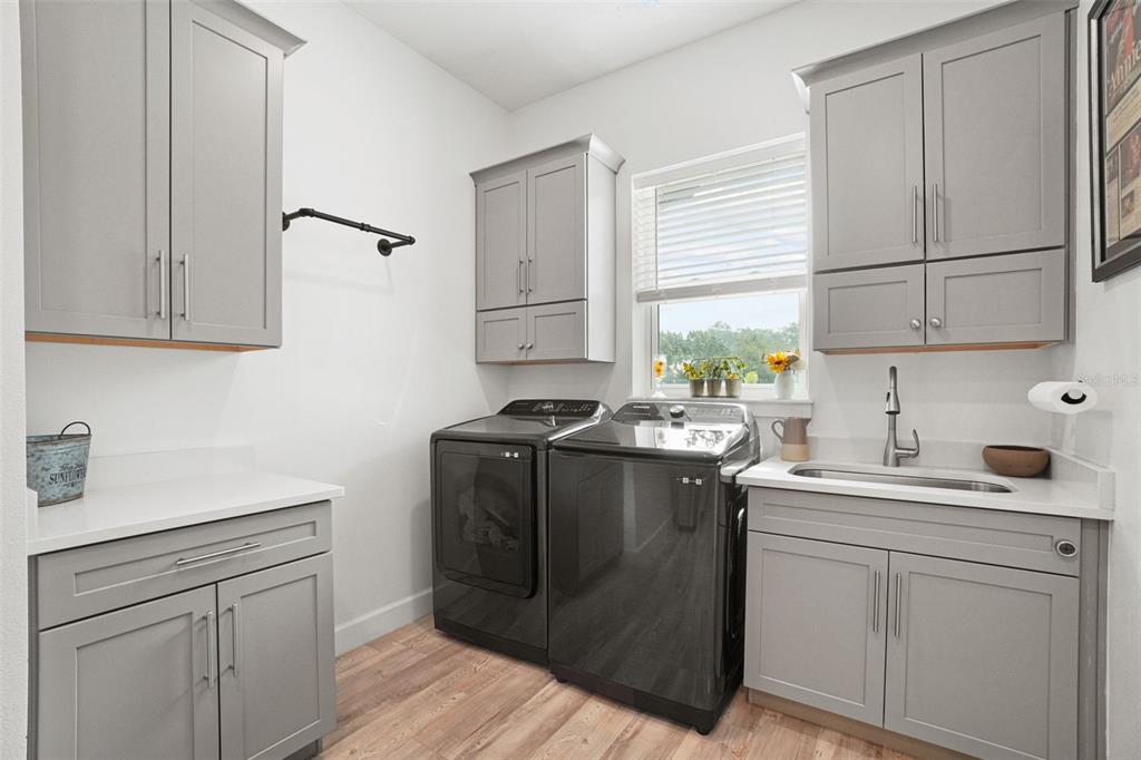 3230 Pheasant Trail Mims, FL 32754 - Photo 19 of 71 a kitchen with a sink cabinets and window