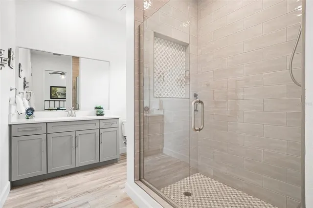 a bathroom with a bathtub and a shower
