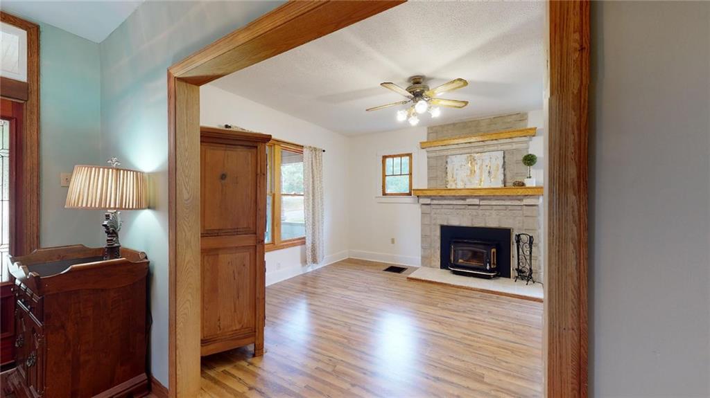 114 West Ingomar Road Pittsburgh, PA 15237 - Photo 3 of 23 Living room with a beautiful concrete log burning fireplace/woodburner
