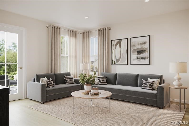 2119 Destination Drive, Unit A Sandston, VA 23150 - Photo 4 of 9 a living room with furniture and a large window