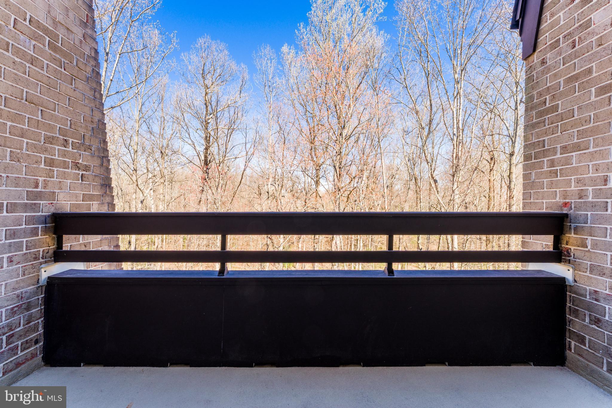 11564 Rolling Green Court, Unit 12/301B Reston, VA 20191 - Photo 27 of 31 a view of a bench in the roof