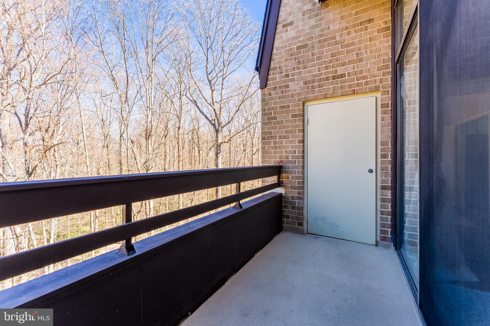 11564 Rolling Green Court, Unit 12/301B Reston, VA 20191 - Photo 29 of 31 a view of a large window