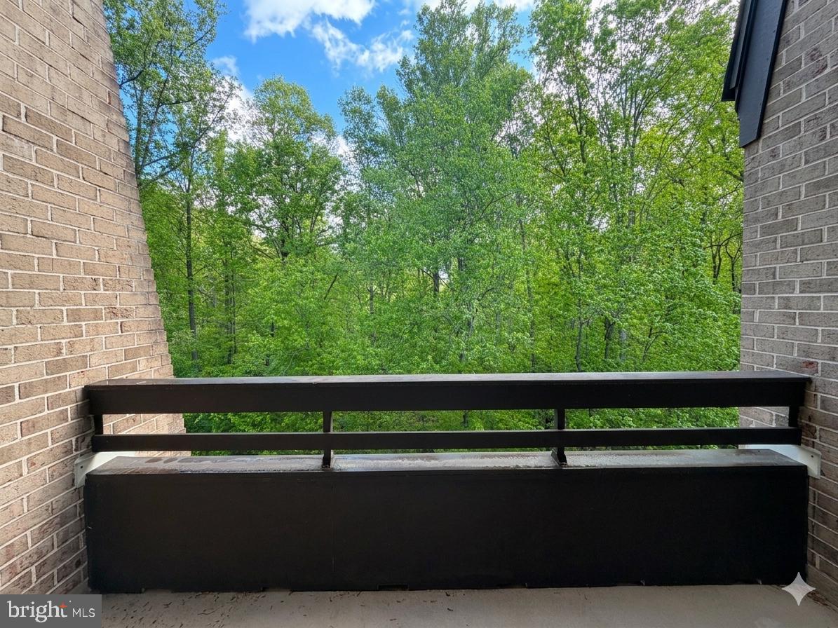 11564 Rolling Green Court, Unit 12/301B Reston, VA 20191 - Photo 6 of 31 a view of outdoor space with seating