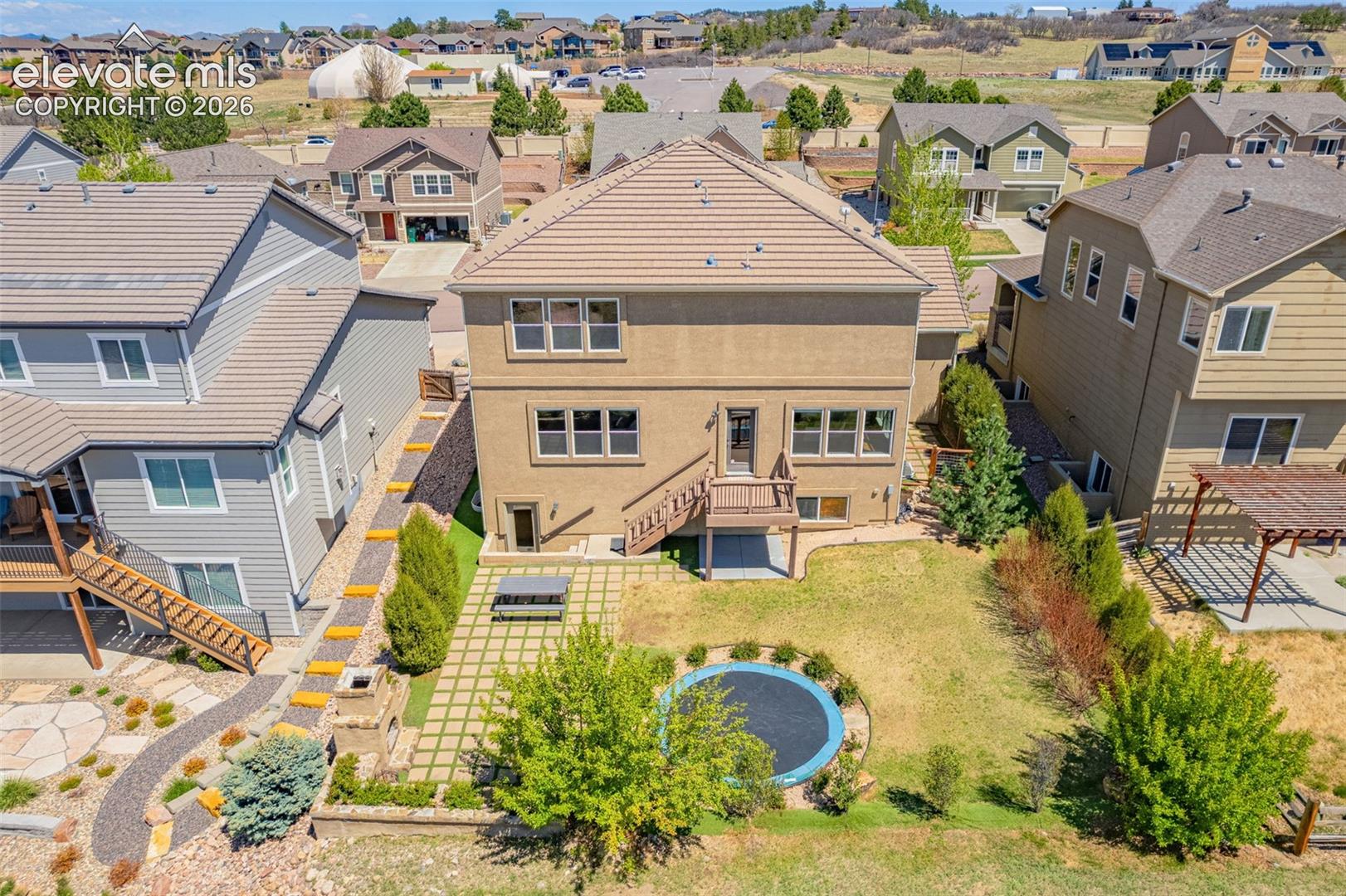 1364 Diamond Rim Drive Colorado Springs, CO 80921 - Photo 43 of 48 Private gated dog run and hammock hangout with hedge to the right side of the house; apple trees to the south side, mature bushes throughout