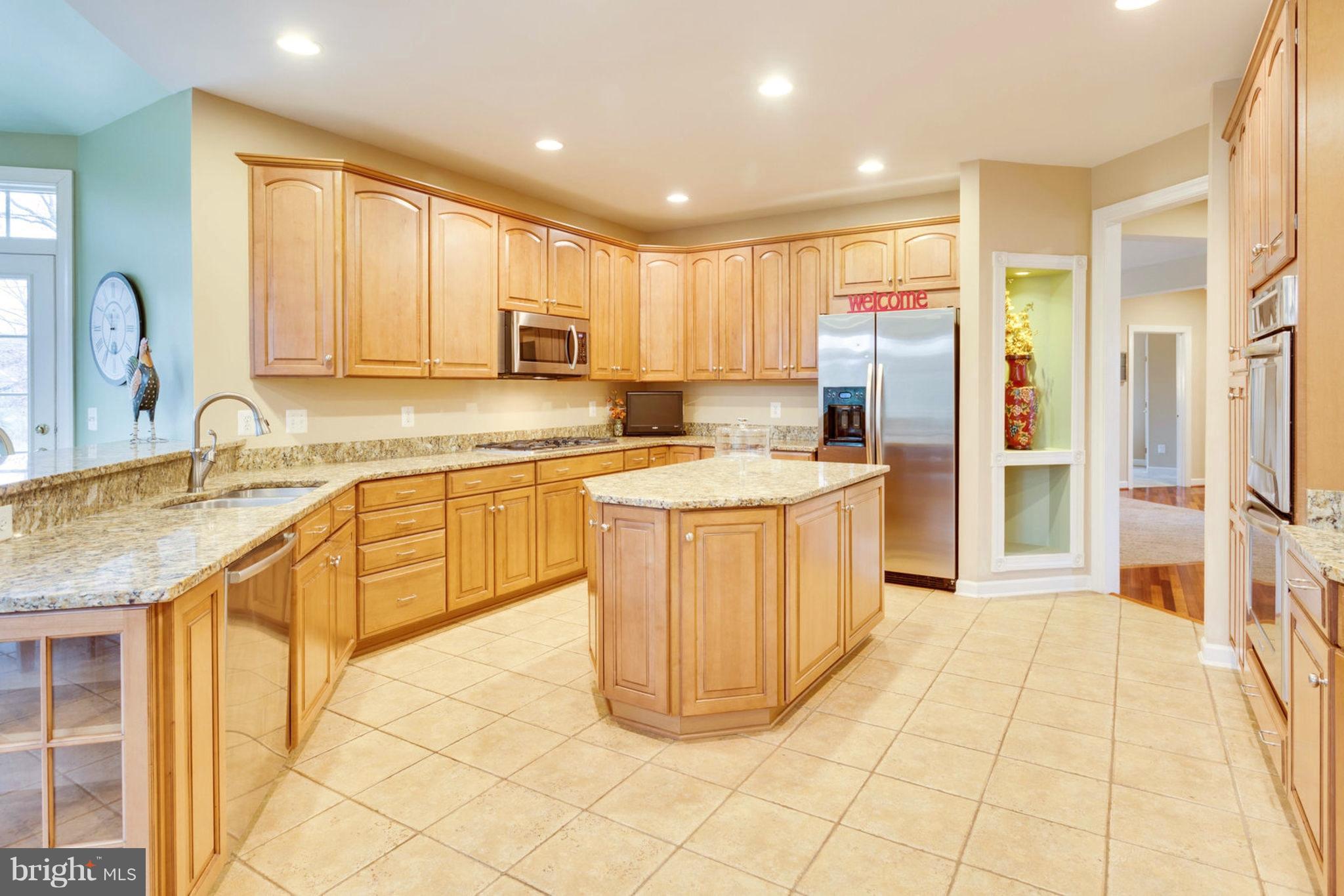 4574 Gates Road Warrenton, VA 20187 - Photo 14 of 49 Abundant Cabinets And Granite Countertops