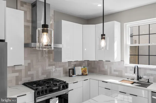 a bathroom with a toilet sink and shower