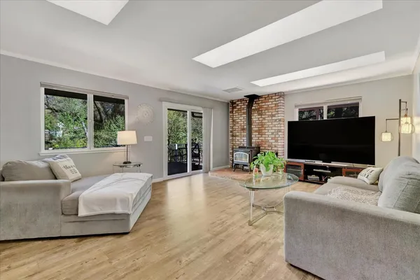 a spacious bedroom with a bed and a window