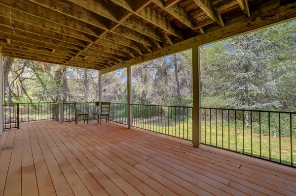 a view of a lake with houses in the back