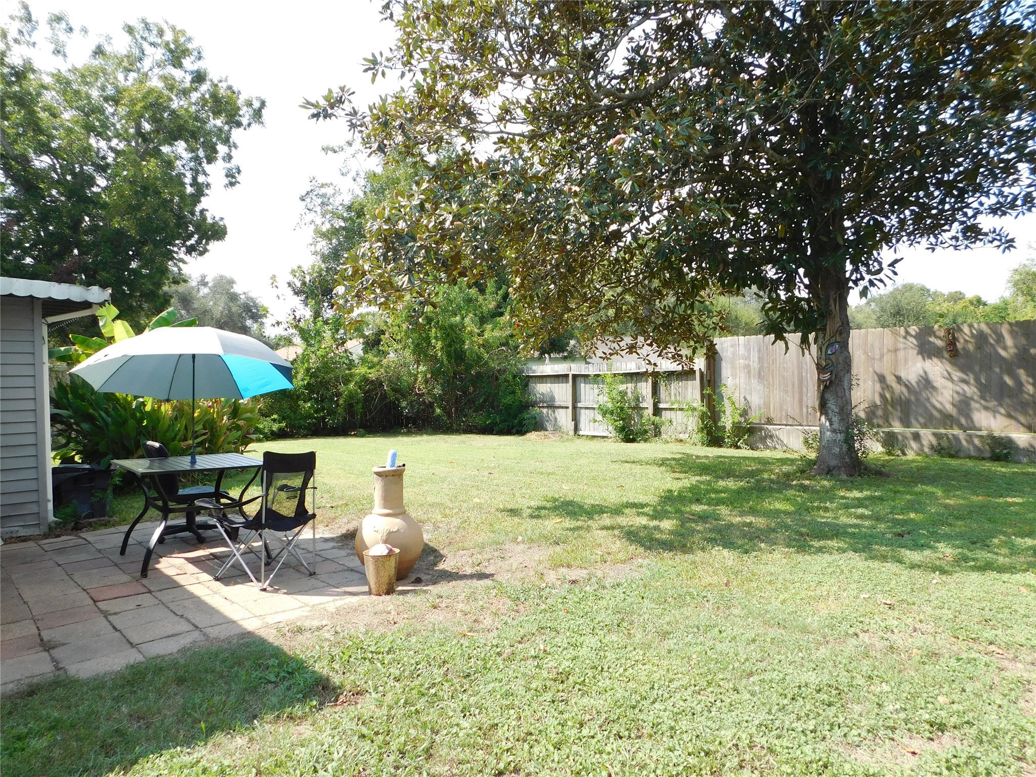5003 Apple Springs Drive Pearland, TX 77584 - Photo 27 of 29 a view of a house with backyard and sitting area