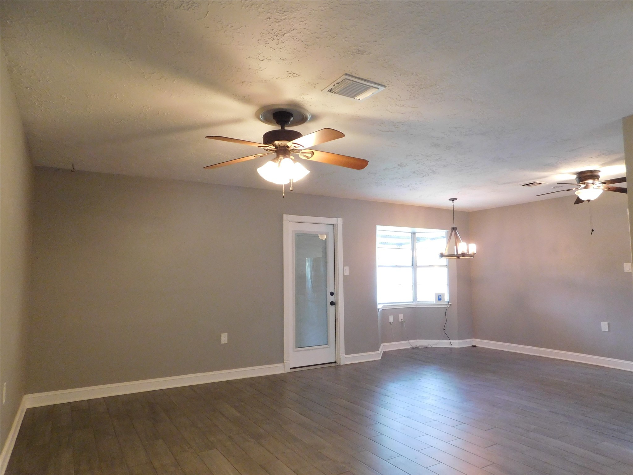 5003 Apple Springs Drive Pearland, TX 77584 - Photo 5 of 29 a view of an empty room with a window