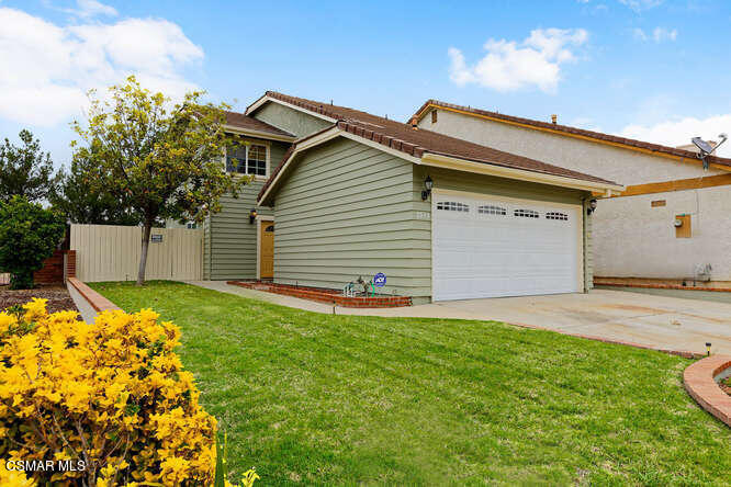 3345 Manorgate Place Simi Valley, CA 93065 - Photo 2 of 27 a view of a house with a yard