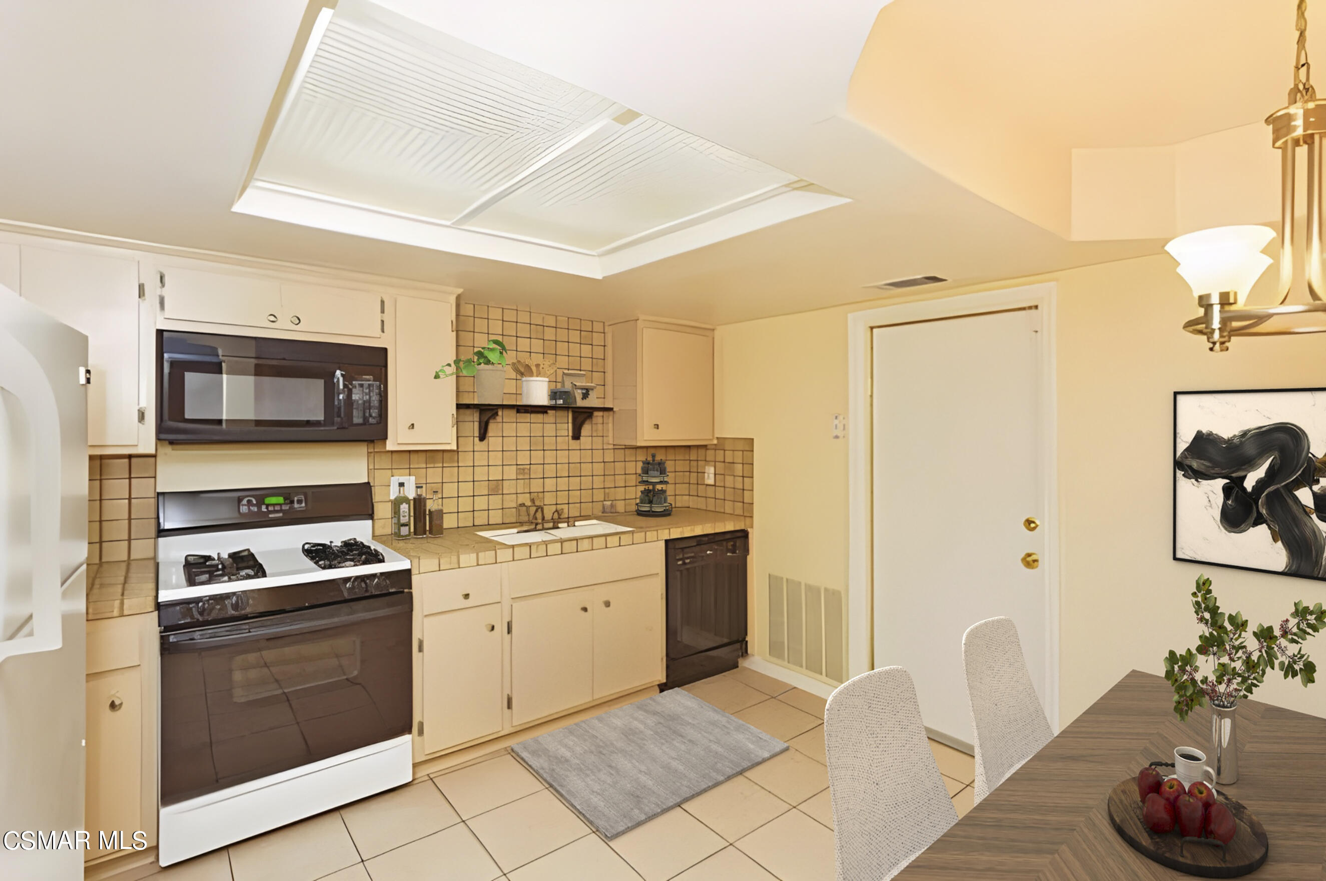 3345 Manorgate Place Simi Valley, CA 93065 - Photo 11 of 27 a kitchen with granite countertop a sink stainless steel appliances and cabinets