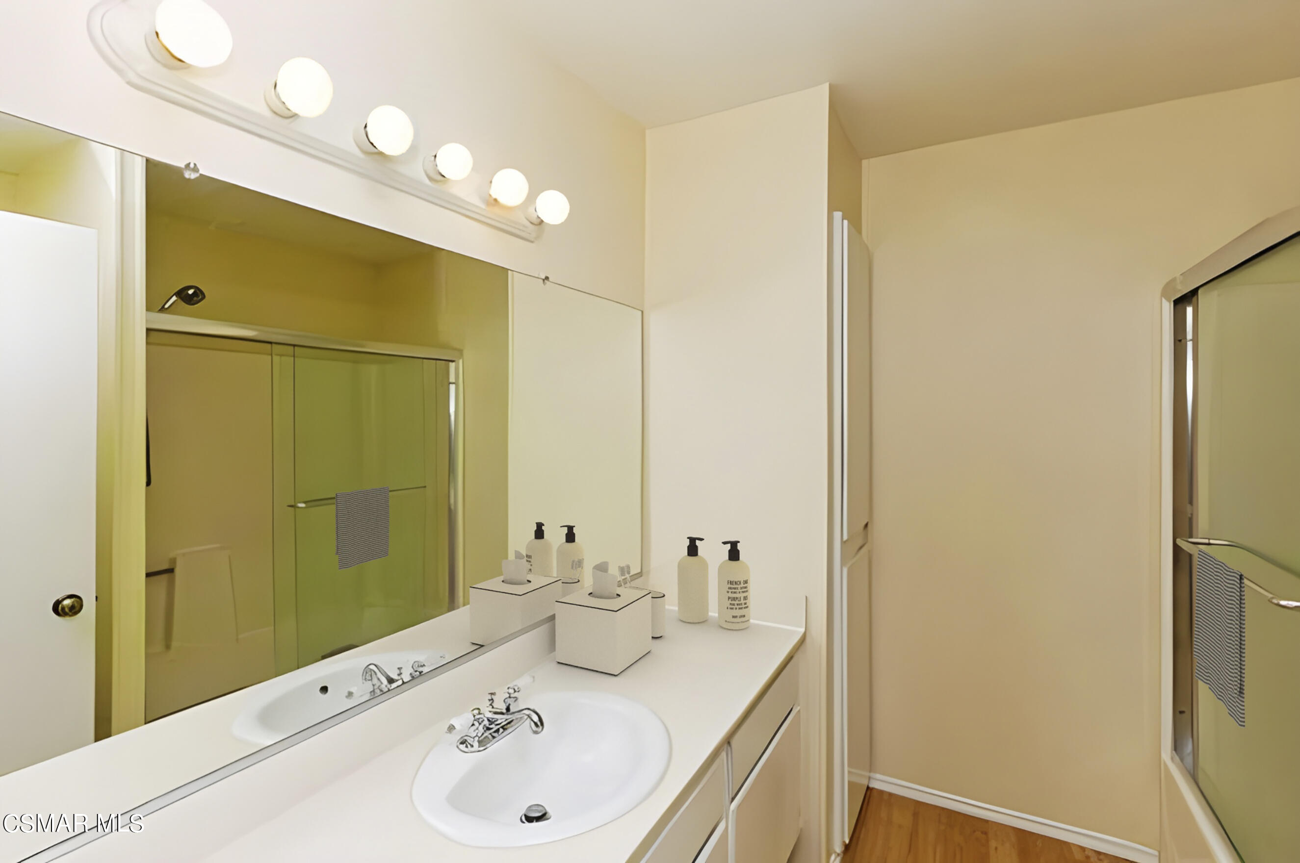 3345 Manorgate Place Simi Valley, CA 93065 - Photo 17 of 27 a bathroom with a sink and a mirror