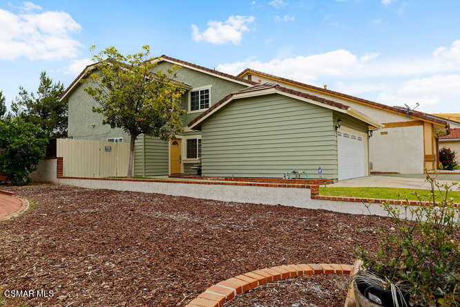 3345 Manorgate Place Simi Valley, CA 93065 - Photo 18 of 27 a view of a house with a yard and sitting area