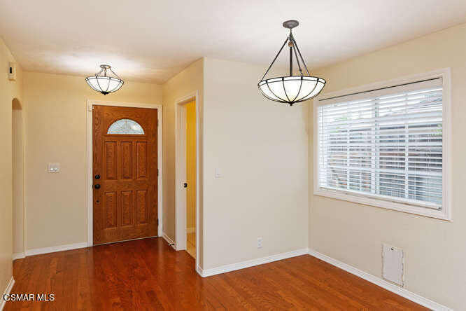 3345 Manorgate Place Simi Valley, CA 93065 - Photo 23 of 27 a view of a room with wooden floor and window