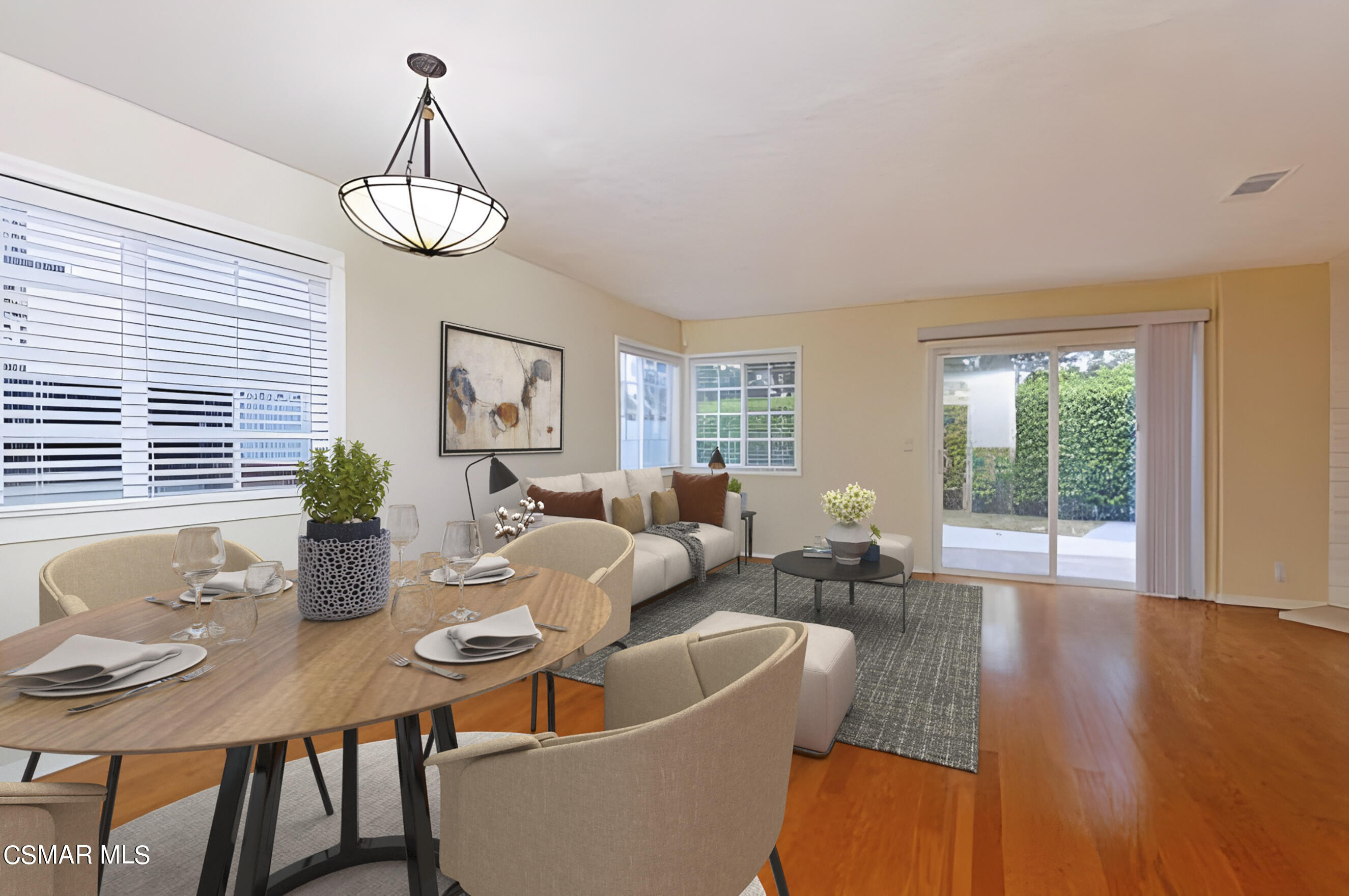 3345 Manorgate Place Simi Valley, CA 93065 - Photo 6 of 27 a living room with furniture a chandelier and a table