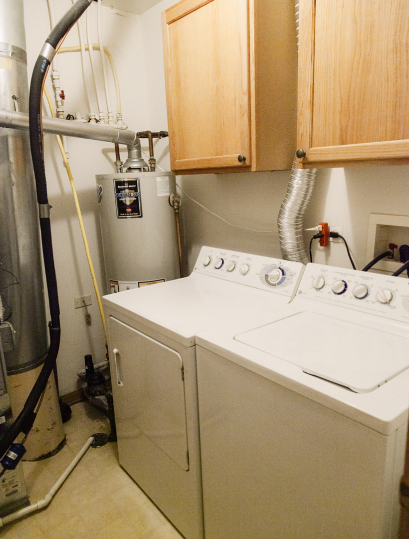1533 Keystone Court Elgin, IL 60120 - Photo 15 of 16 a utility room with dryer and washer
