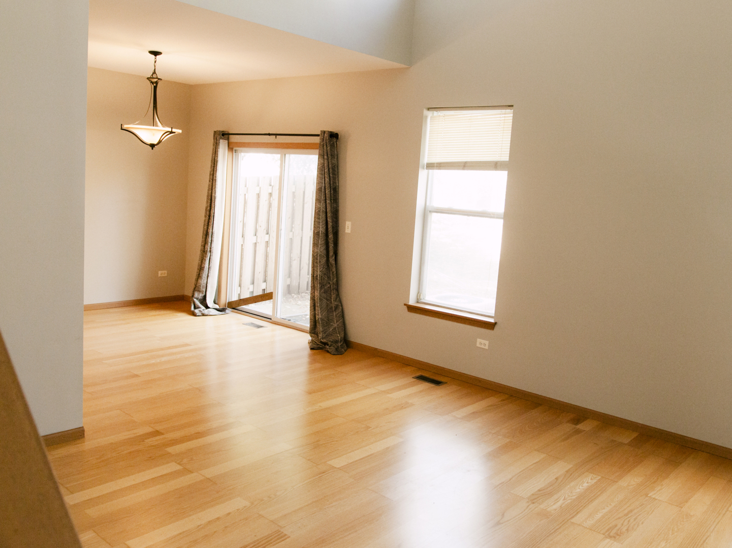1533 Keystone Court Elgin, IL 60120 - Photo 5 of 16 a view of an empty room with a window