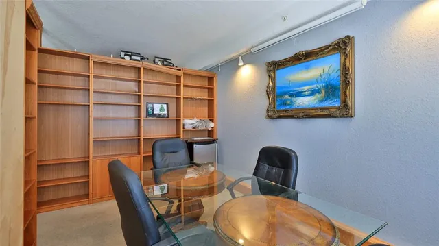 a workspace with furniture and wooden floor