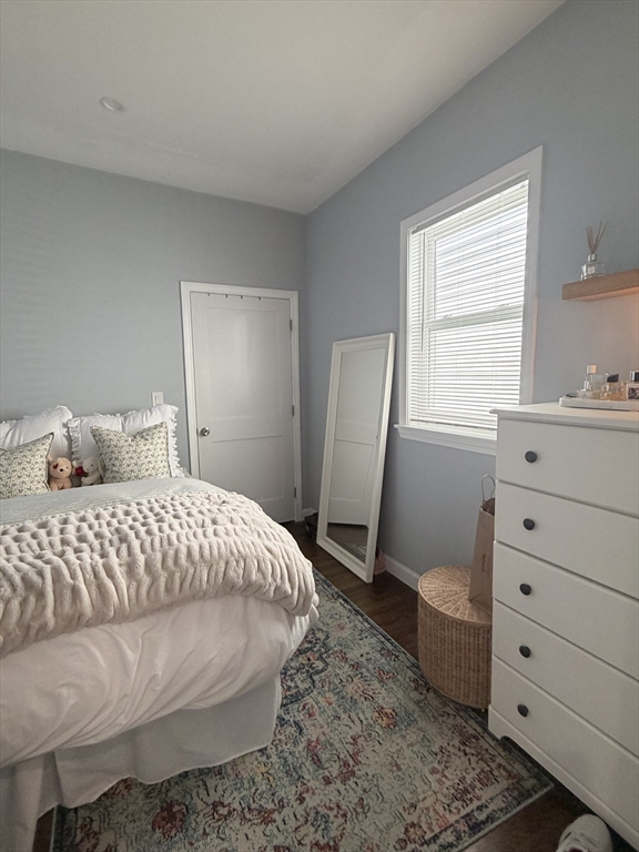 562 East 7th Street, Unit 2 Boston, MA 02127 - Photo 4 of 18 a bedroom with a bed and a dresser