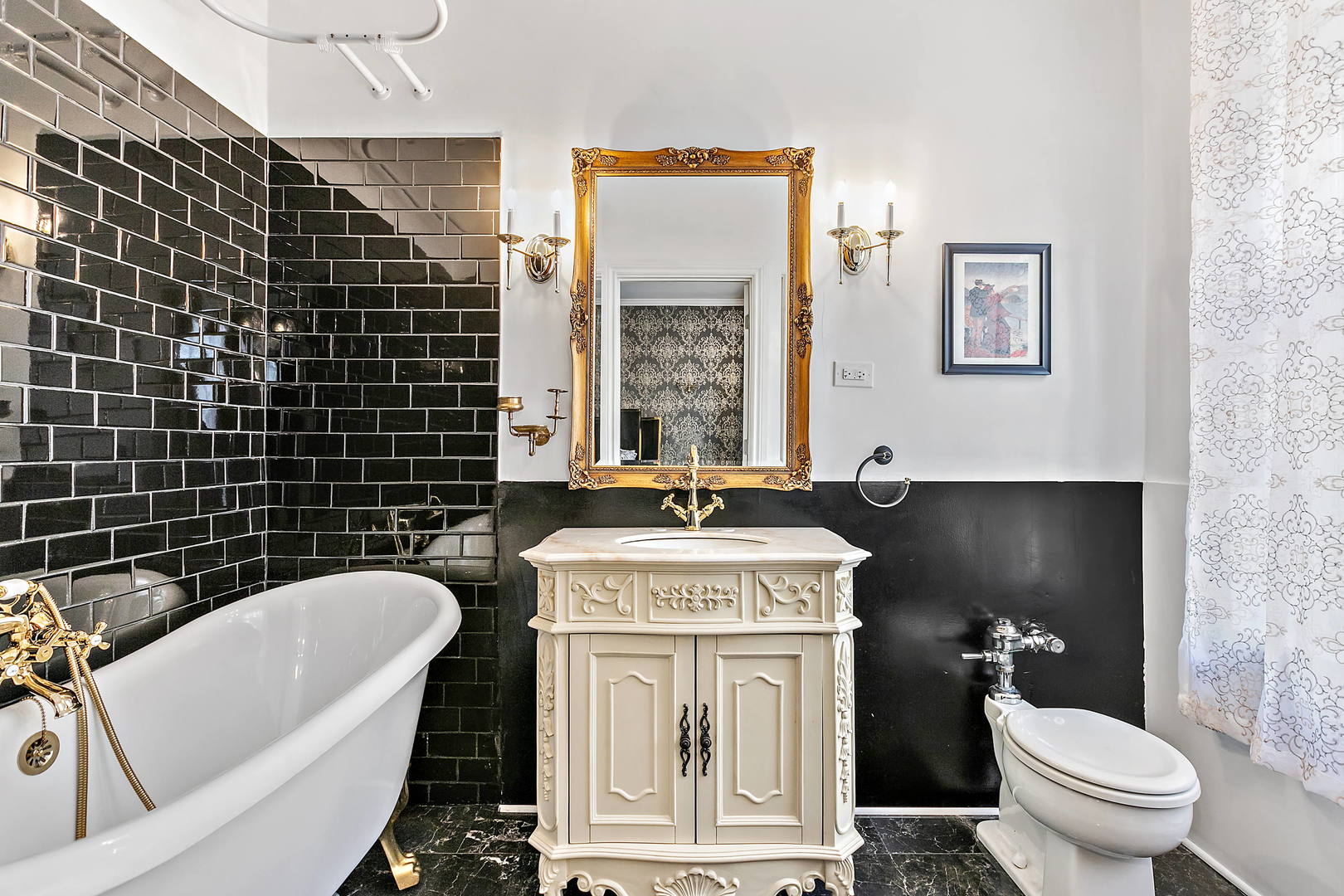 60 East Scott Street, Unit 703 Chicago, IL 60610 - Photo 18 of 27 a bathroom with a granite countertop toilet a sink and a bathtub