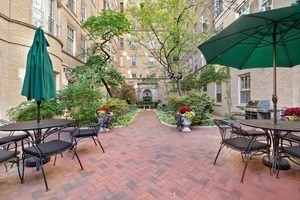 60 East Scott Street, Unit 703 Chicago, IL 60610 - Photo 24 of 27 a view of an outdoor sitting area with golf course