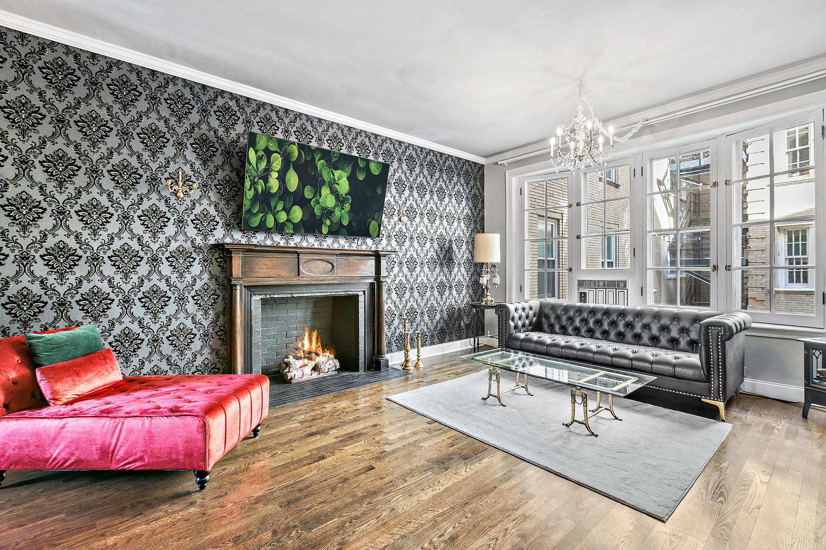 60 East Scott Street, Unit 703 Chicago, IL 60610 - Photo 7 of 27 a living room with furniture and a fireplace