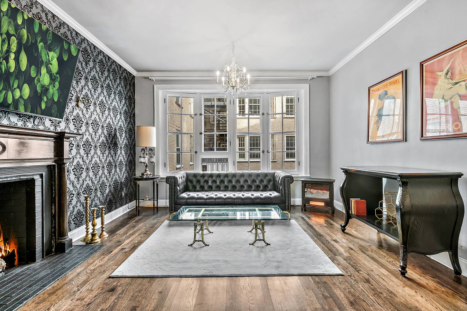 60 East Scott Street, Unit 703 Chicago, IL 60610 - Photo 8 of 27 a living room with furniture and a fireplace