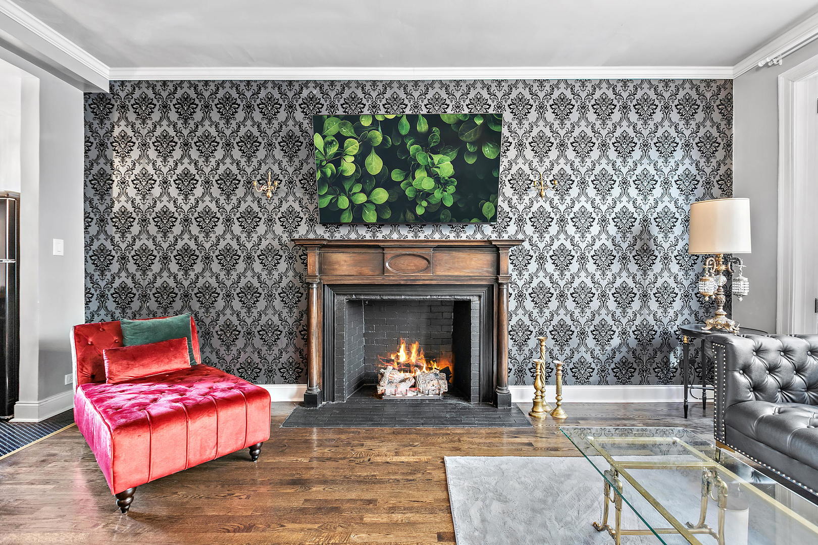 60 East Scott Street, Unit 703 Chicago, IL 60610 - Photo 9 of 27 a living room with a couch and a fireplace