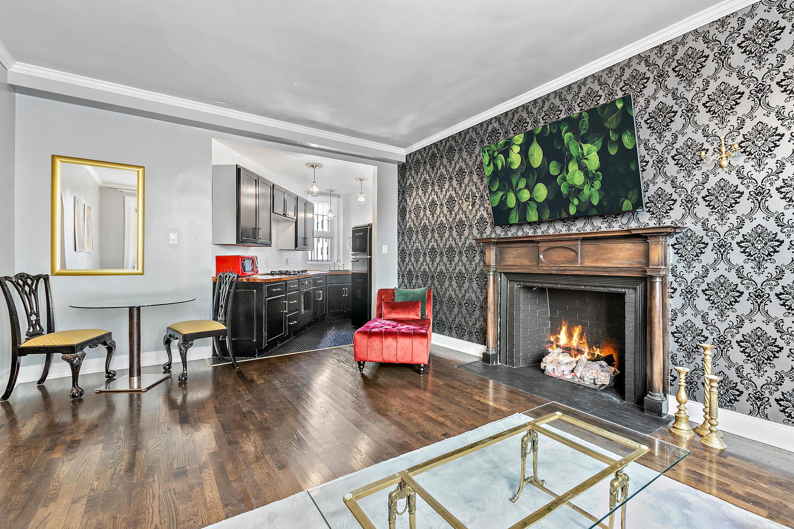 60 East Scott Street, Unit 703 Chicago, IL 60610 - Photo 10 of 27 a living room with furniture and a fireplace