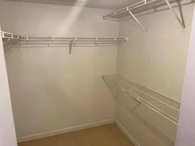 a view of a room with racks on the wall