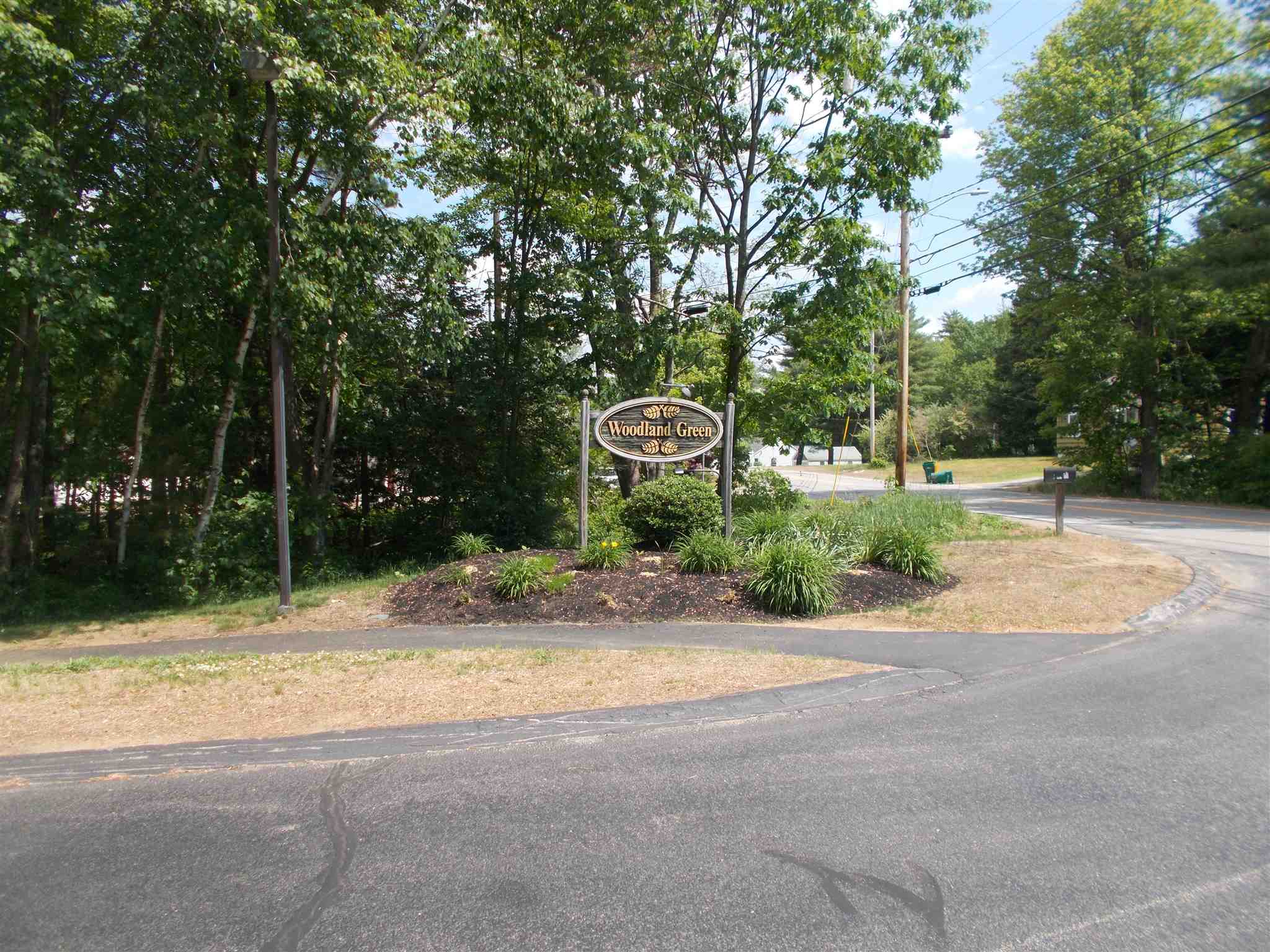 9 Woodland Green Rochester, NH 03868 - Photo 1 of 6 Gallery Image 1