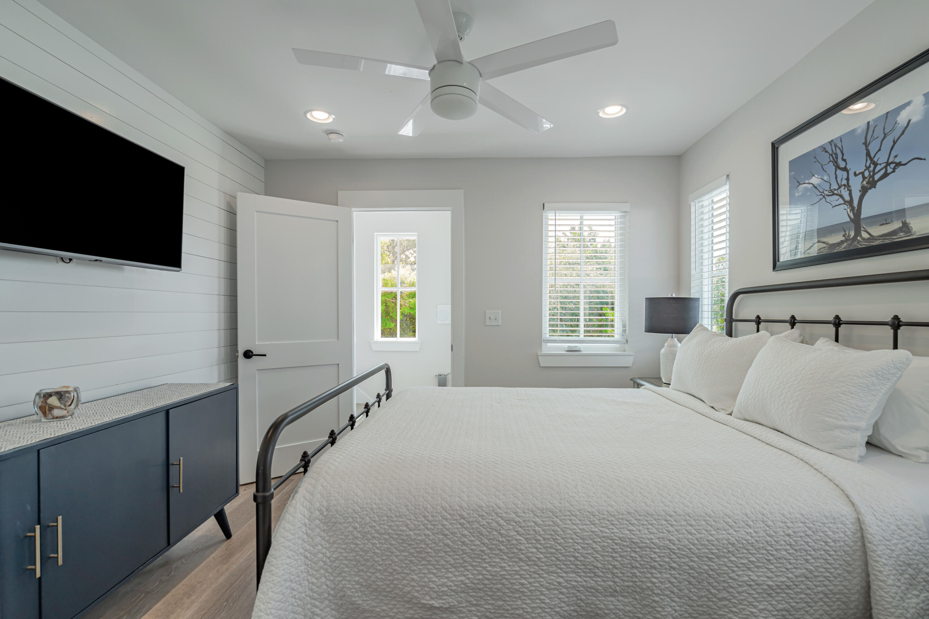 41 Abbie Road Santa Rosa Beach, FL 32459 - Photo 22 of 38 a bedroom with a large bed and a flat screen tv