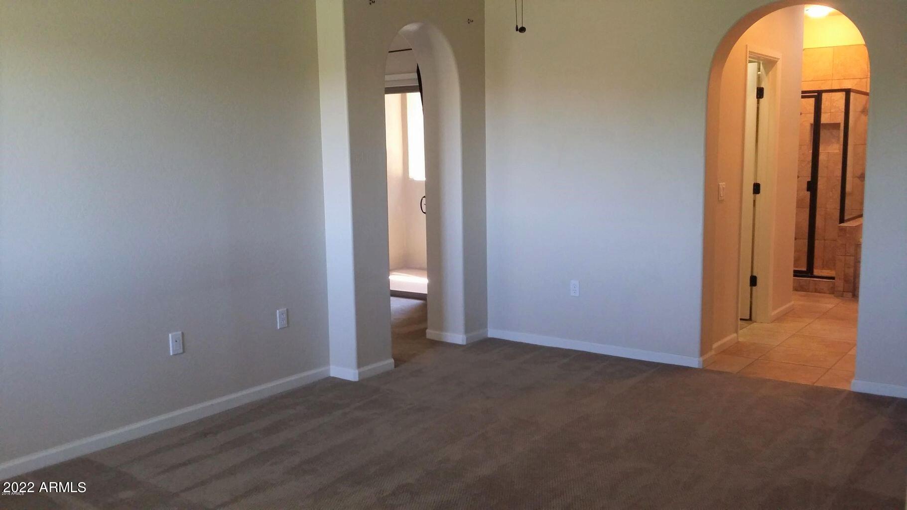 3935 East Rough Rider Road, Unit 1074 Phoenix, AZ 85050 - Photo 14 of 22 Primary bedroom 2